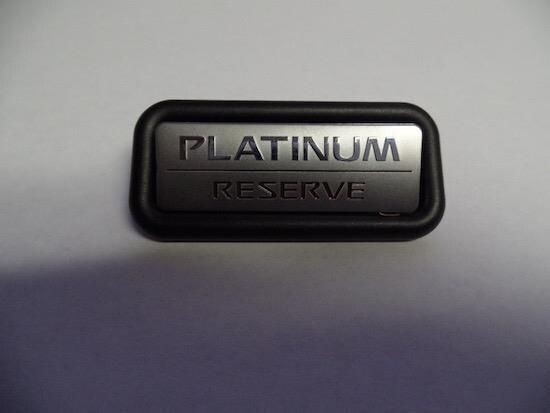 NISSAN ARMADA PLATINUM RESERVE SEAT BACK EMBLEM
