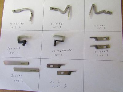 Lot of 11 loopers and attachments for sewing machines