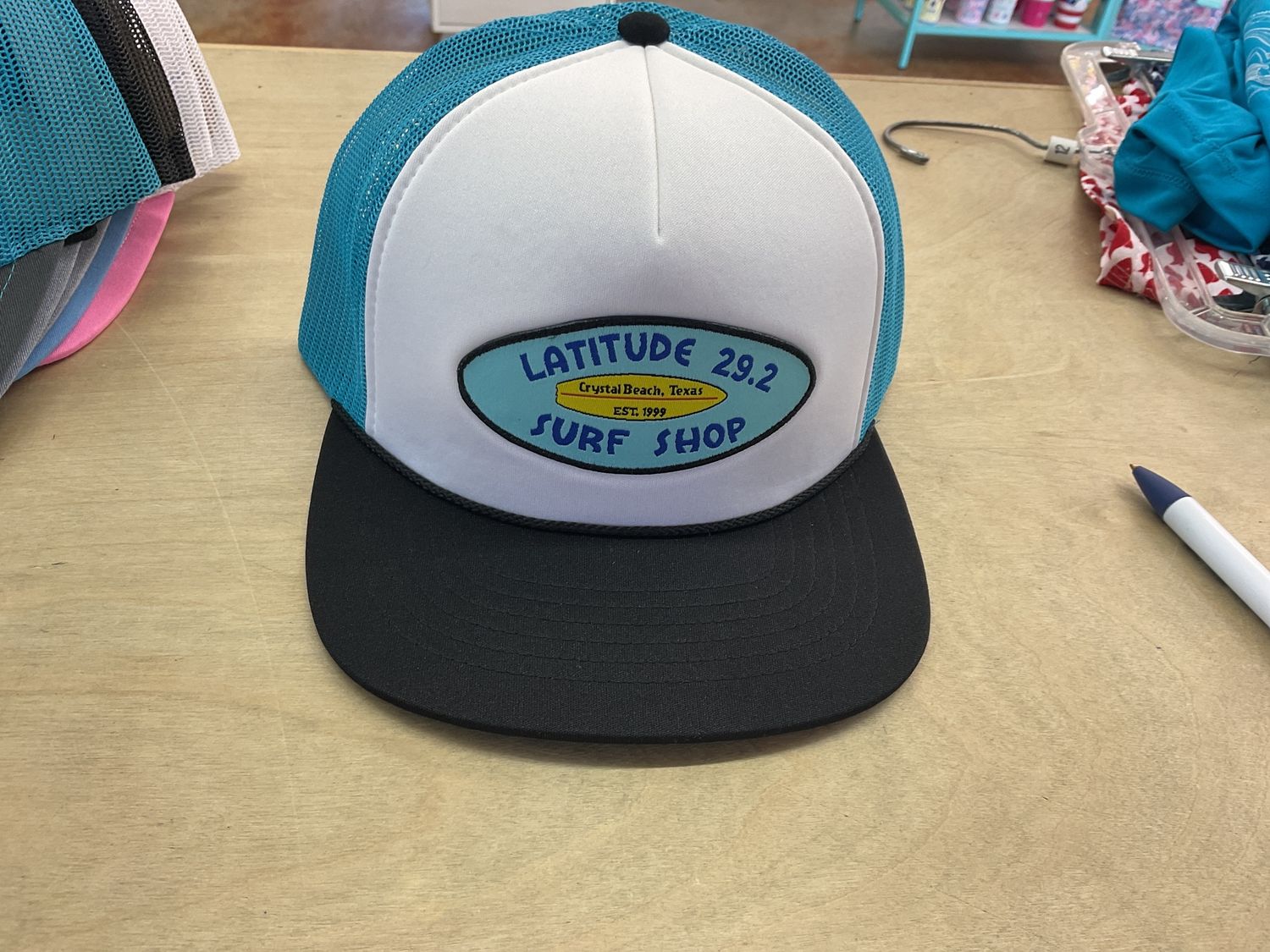 Richardson 112 white, neon blue, with black bill Latitude OG logo
