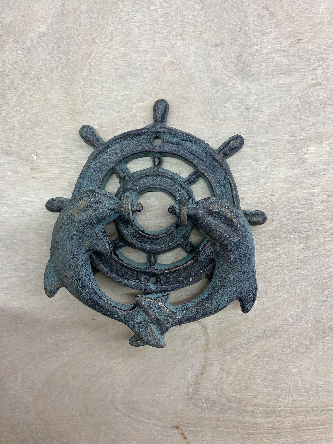 Metal dolphin door knockers