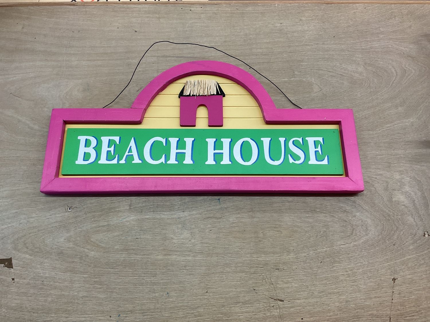 WOODEN PINK BEACH HOUSE SIGN