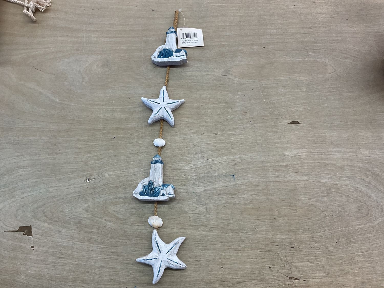 WOODEN LIGHTHOUSE AND STARFISH SIGN