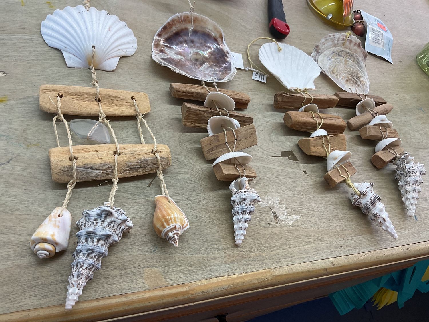 Hanging shells with wooden blocks