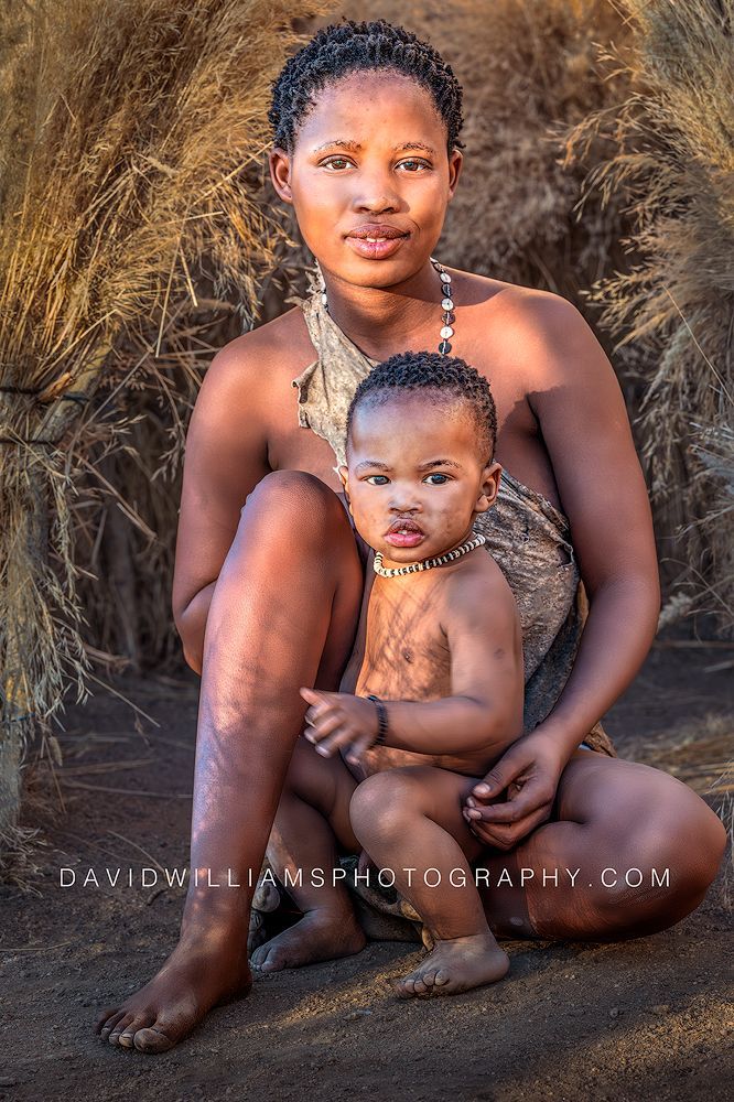 Namibia San Tribe Woman With Son 2582375