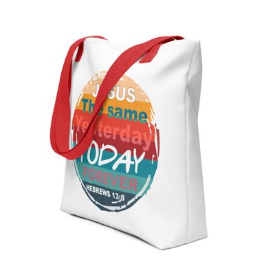 a white canvas bag with red handles featuring a colorful retro sun design with a Bible verse