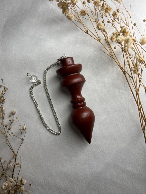 Pendule en bois brun