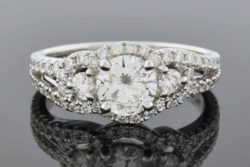 Three Stone Engagement Ring with Diamond Trim