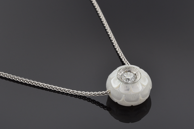 Carved pearl and diamond necklace by Galatea