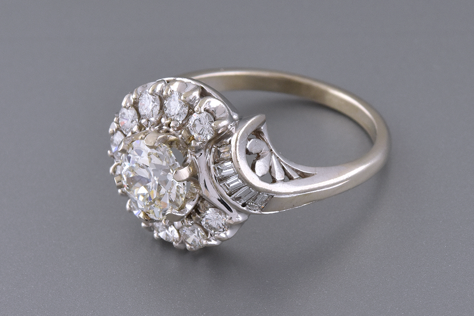 Encircled Diamond Ring with a Subtle Accent Detail