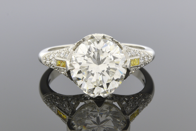 Engagement Ring with Yellow Diamond Trim