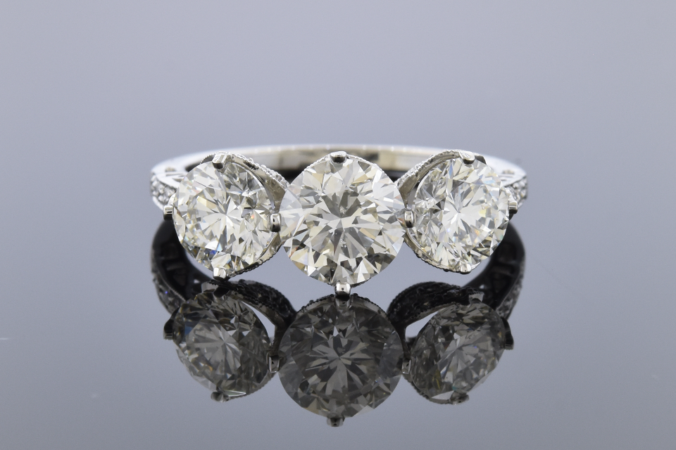 Three Stone Diamond Ring with Open Design Details