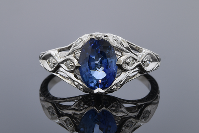 Bright Sapphire Ring with Modern Art Deco Details