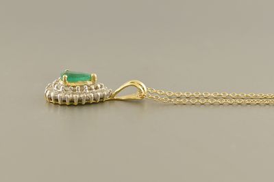 Yellow Gold Emerald Diamond Halo Pendant