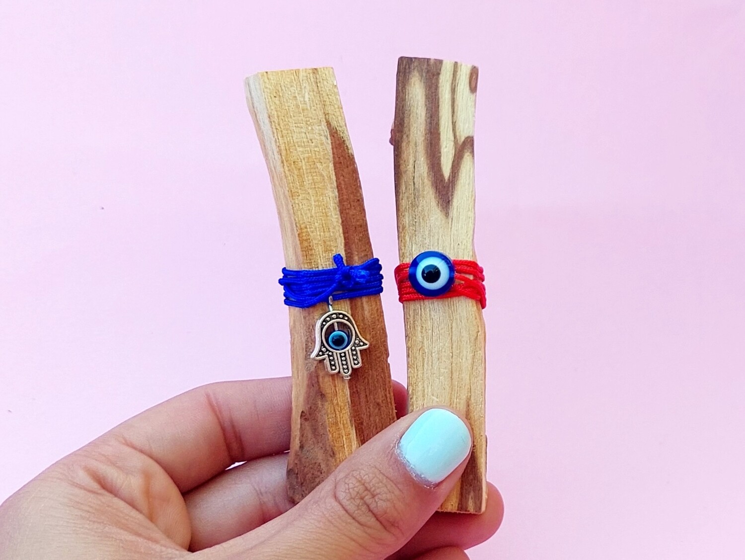 Palito santo con dije 