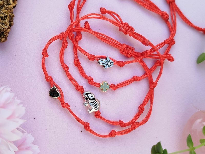 Pulserita 7 nudos con dije