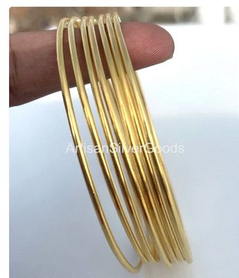 Arisen Gold Filled Bangles - Set of 7 Arisen Gold Filled Bangles - Set of 7