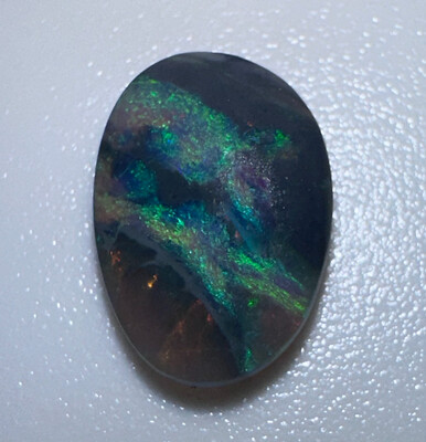 Australian Lightning Ridge Oval Opal cabochon .65 carat