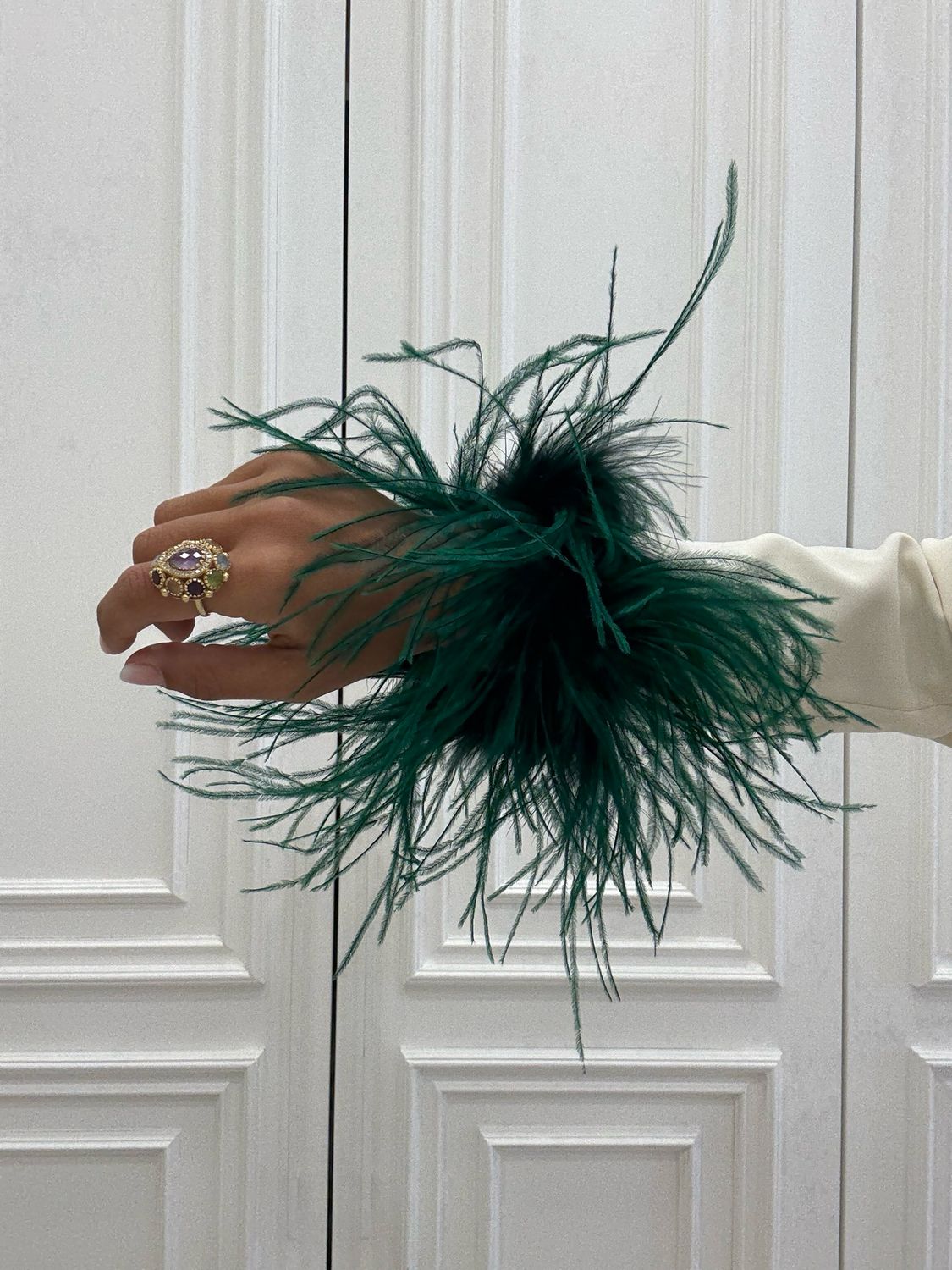 coppia polsi di piume