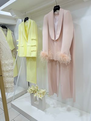 TAIULLEUR rosa con piume