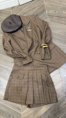 TAIULLEUR con gonna pantalone tartan