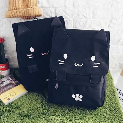 Black canvas backpack with ears, paws and the face of a cartoon cat