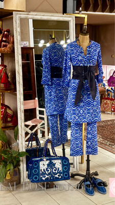 Completo mini abito e pantaloni in lycra elasticizzata 