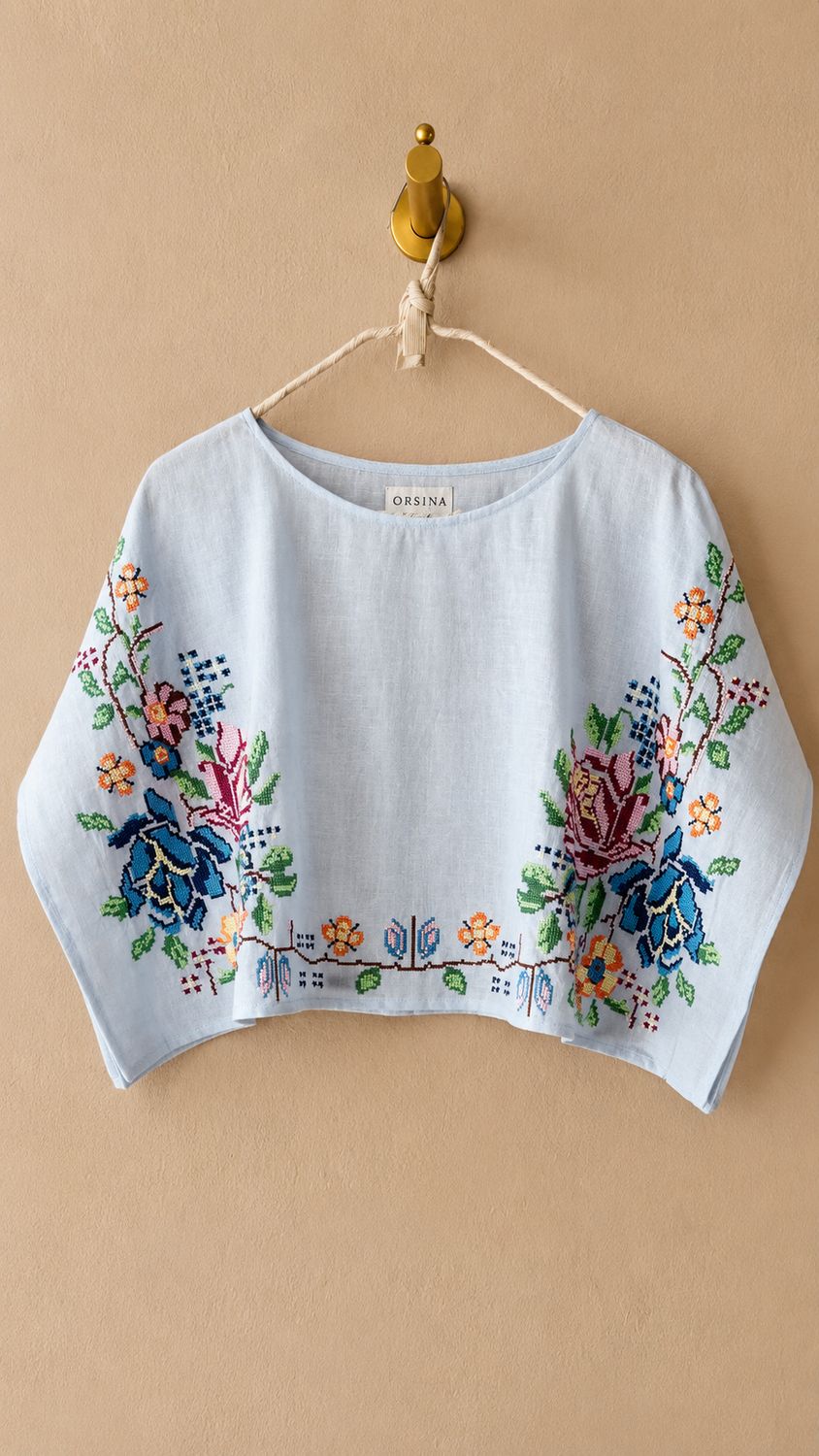 Top fiori colore azzurro