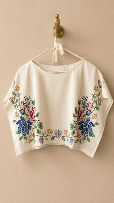 Top fiori colore ecru 