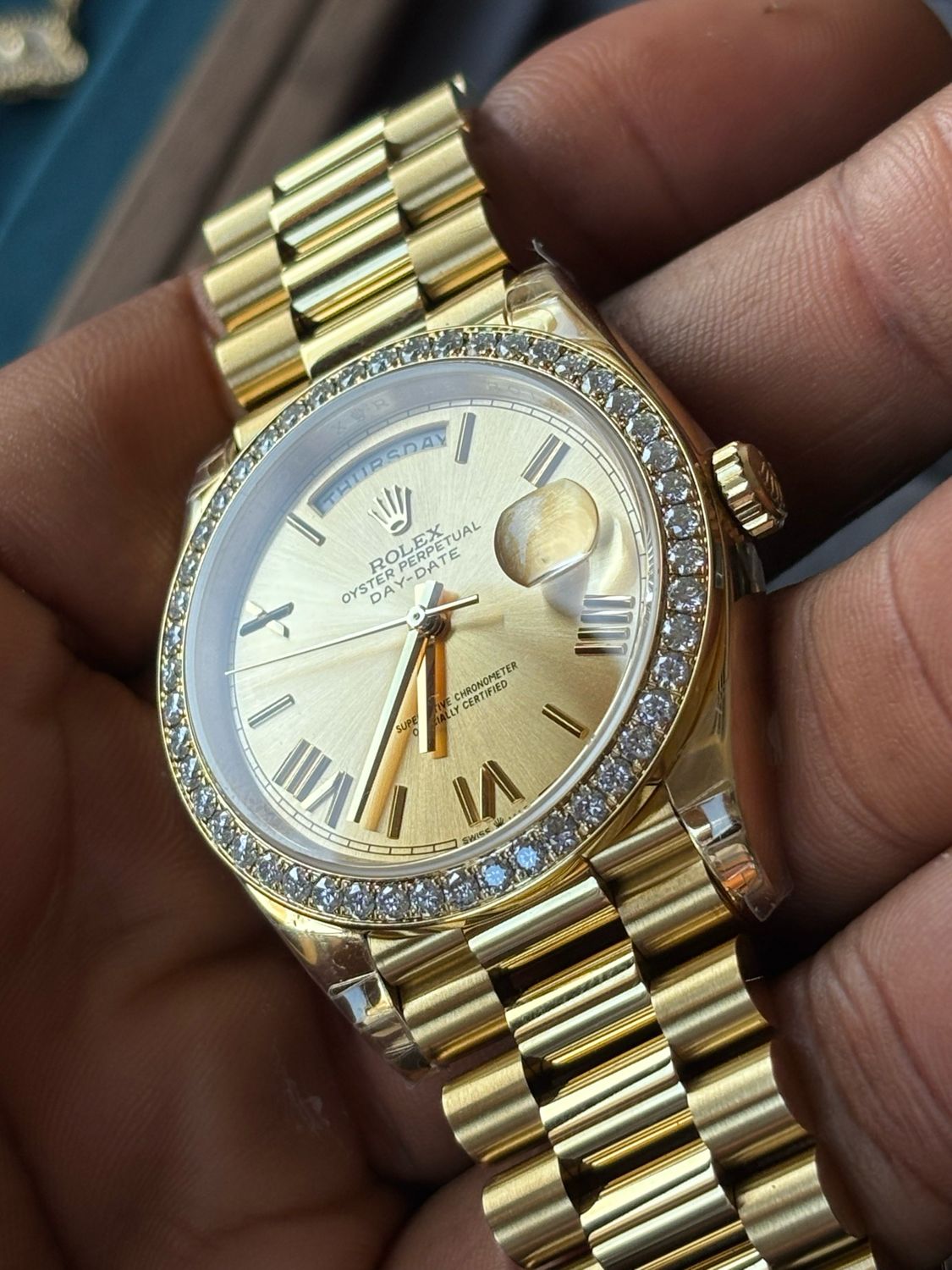 Superclone Studded Bezel Daydate yellow gold, Roman figure champagne dial