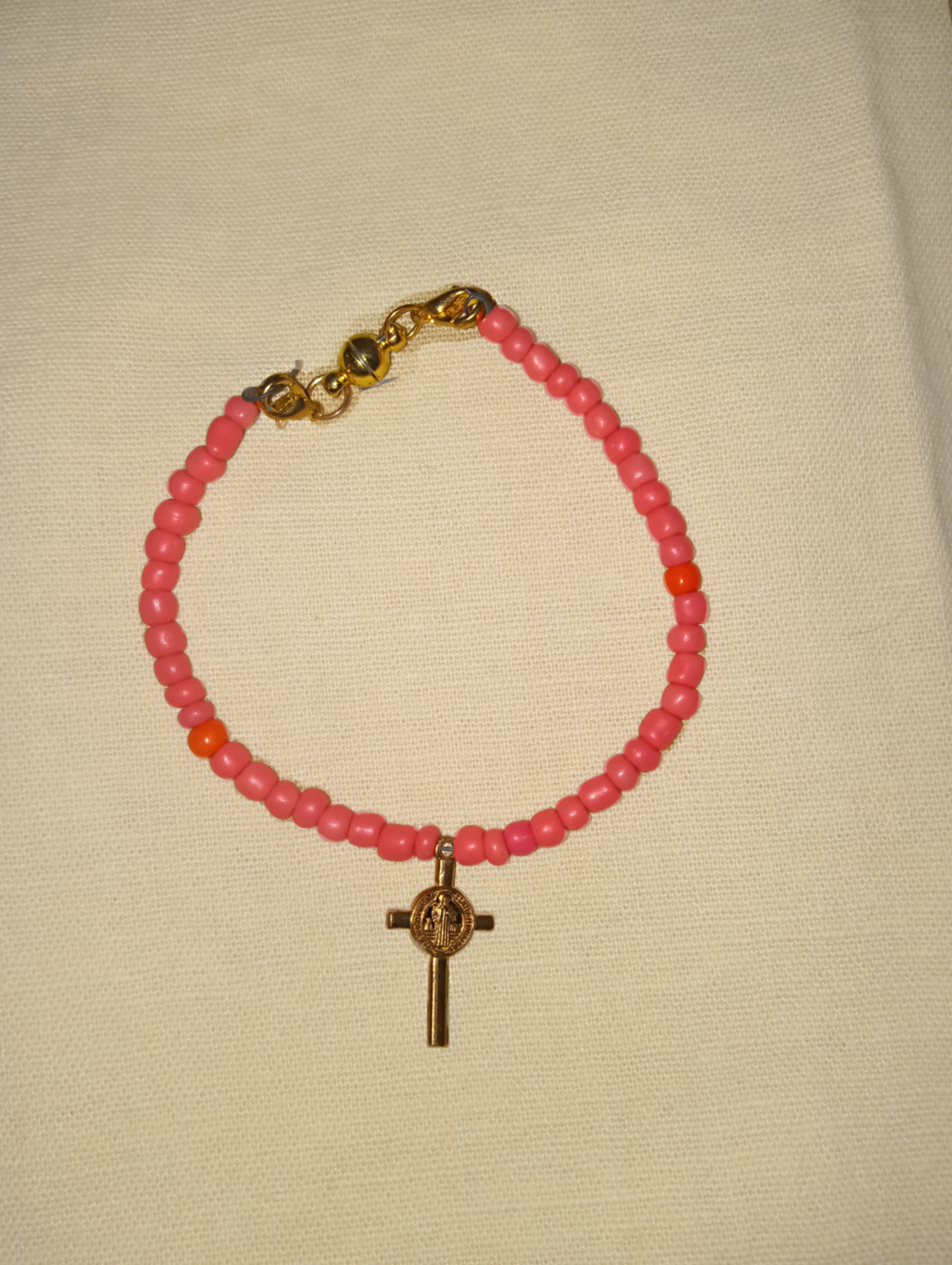 pink cross clasp bracelet