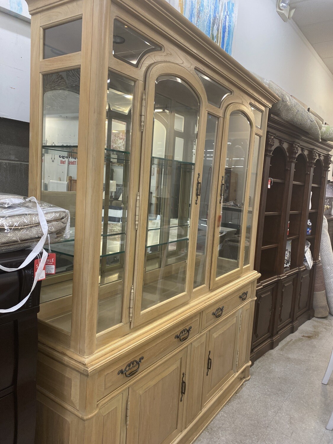 Light wooden china cabinet