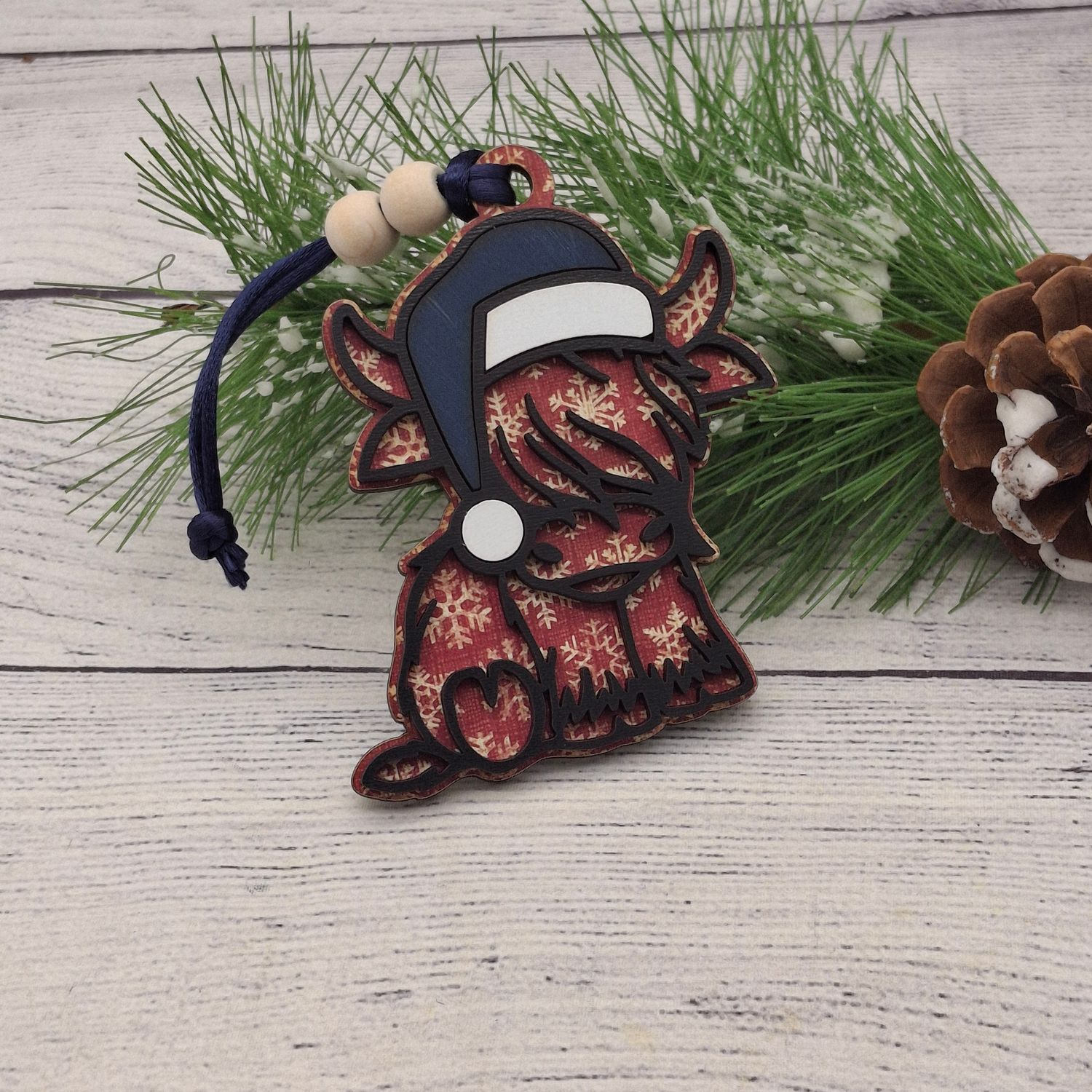 Santa Highland Cow Ornament - Barn Red with Snowflake
