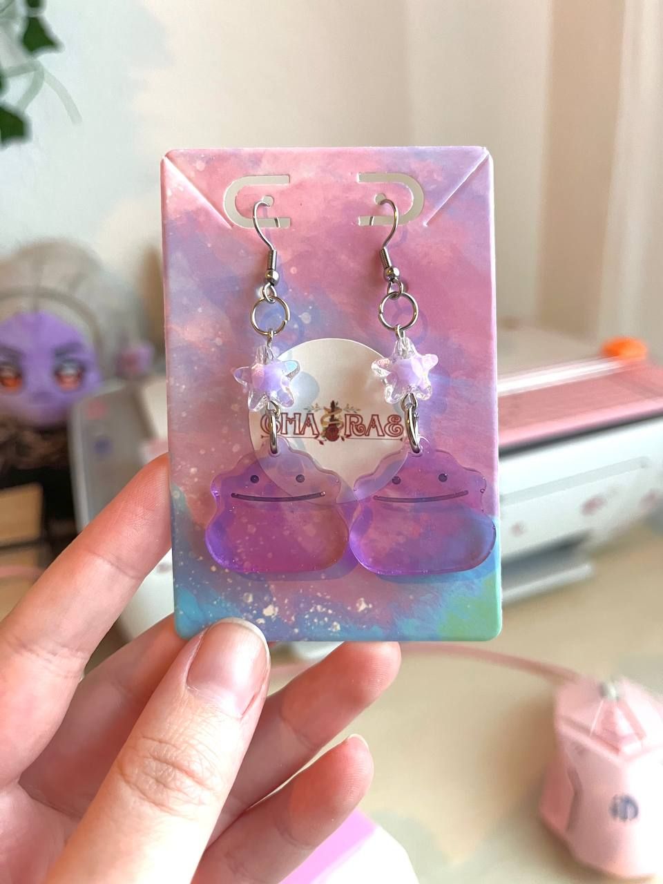 Ditto Earrings and Keychains from Pokopia