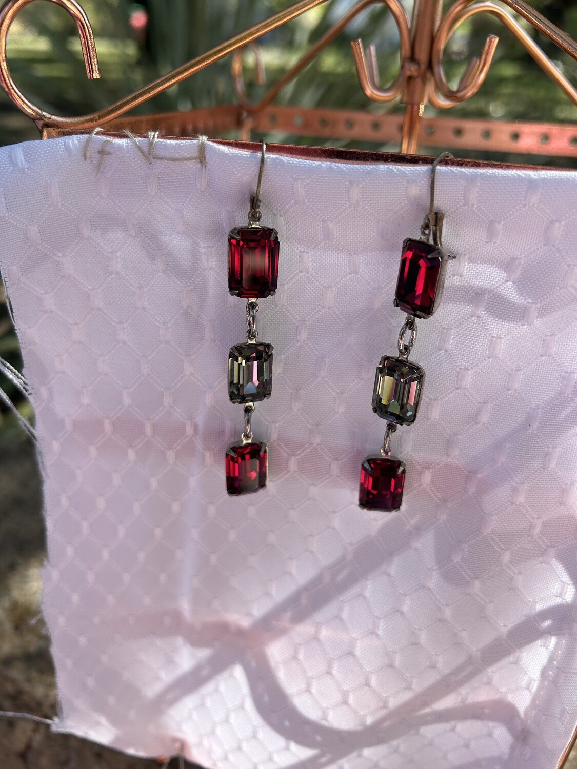 Three-stone dangle earrings