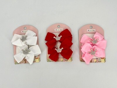 Haarklemmen met strikjes en kroontjes