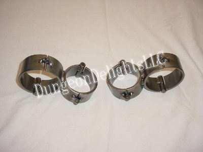 Dungeon Delights X-Cuffs Complete set showing welded wrist and ankle shackles crossed at 90 degrees.