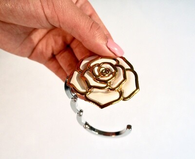 Tassenhaak (witte bloem)