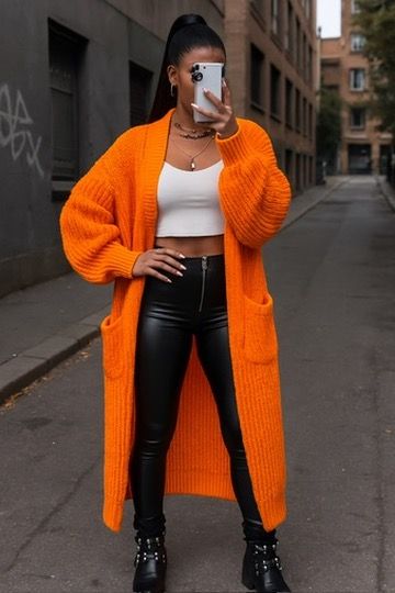 Strickjacke Aurora – Leuchtende Eleganz in Orange