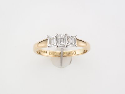 Ladies 18 carat three stone princess cut diamond ring