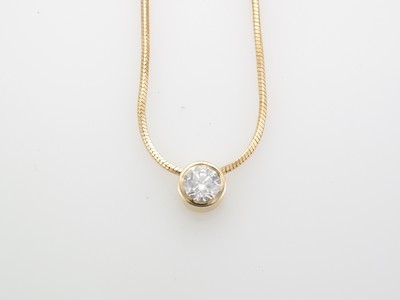 Ladies 18 carat yellow gold diamond pendant and chain