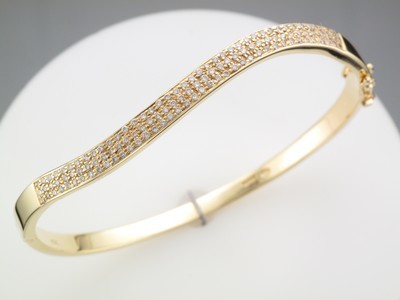 Ladies 18 carat yellow gold diamond set bangle