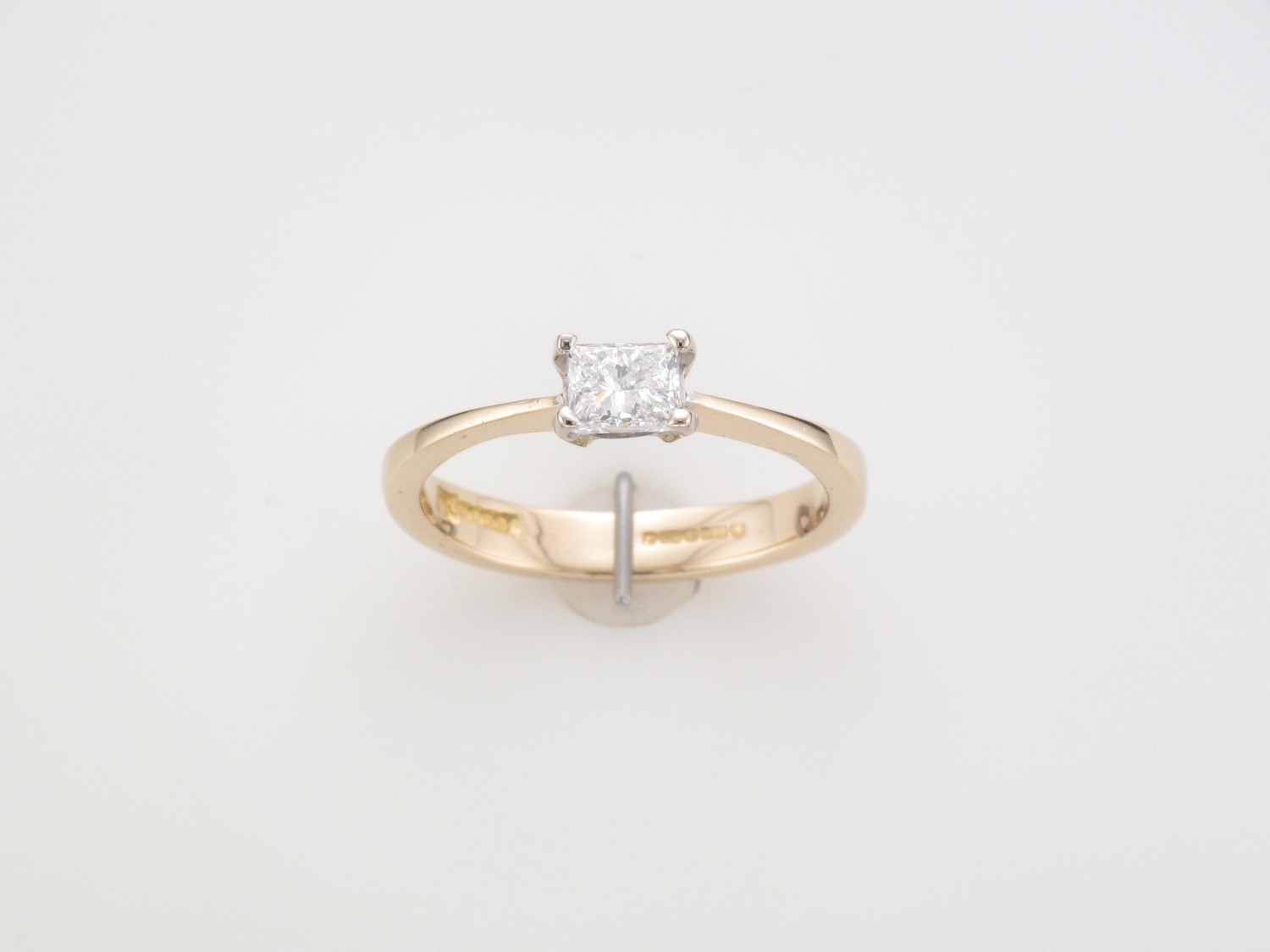 Ladies 18 carat yellow gold emerald cut diamond ring