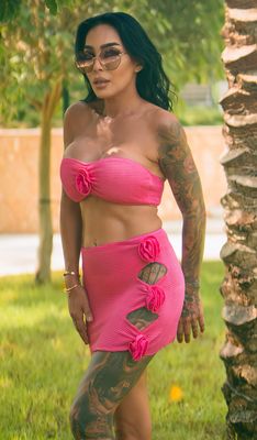 Pink Three-Piece Bikini Set with 3 D Flowers.