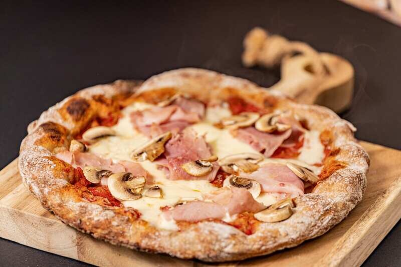 PIZZA ARTESANA PROSCIUTTO