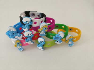 10 Bracciali in gomma personaggi 2D Puffi regali fine festa