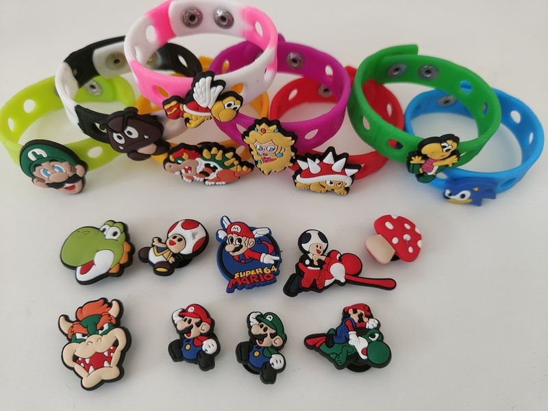 10 Bracciali in gomma personaggi 2D Super Mario regali fine festa