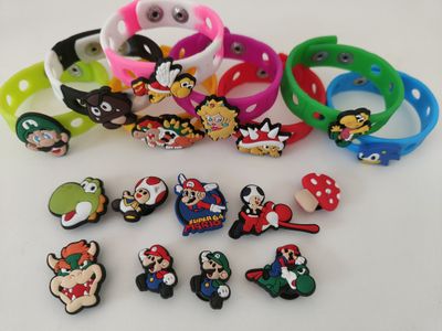 10 Bracciali in gomma personaggi 2D Super Mario regali fine festa