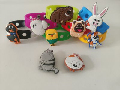 10 Bracciali in gomma personaggi 2D Pets regali fine festa
