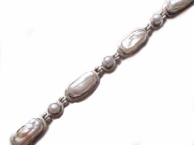 Designer mother of pearl and sterling bracelet