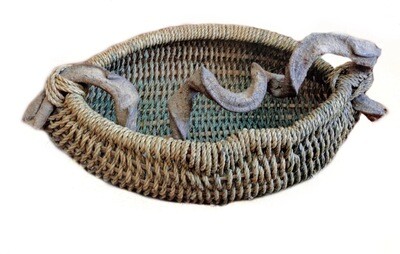 Dramatic artisan woven display and storage basket 